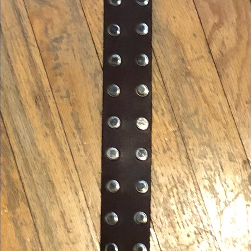 Chunky leather belt with silver tone studs